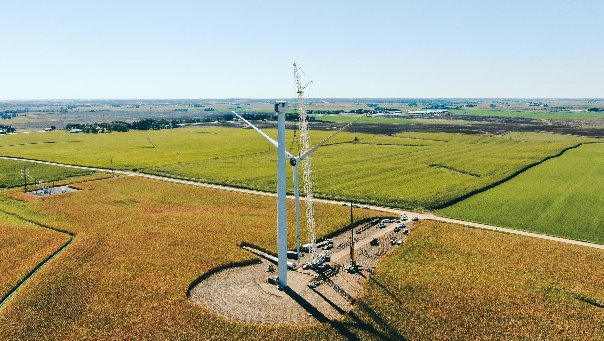 Aerial view of a wind turbine and crane